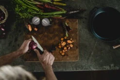 Fiskars Norden Paring Knife -Kitchen Utensils Sale Fiskars Norden Paring knife cutting onion Hero image 1026424